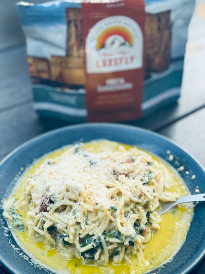 Pasta Carbonara with bacon and organic kale